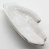 Empty white ceramic hand pocket