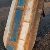 Oval table in polychrome wood
