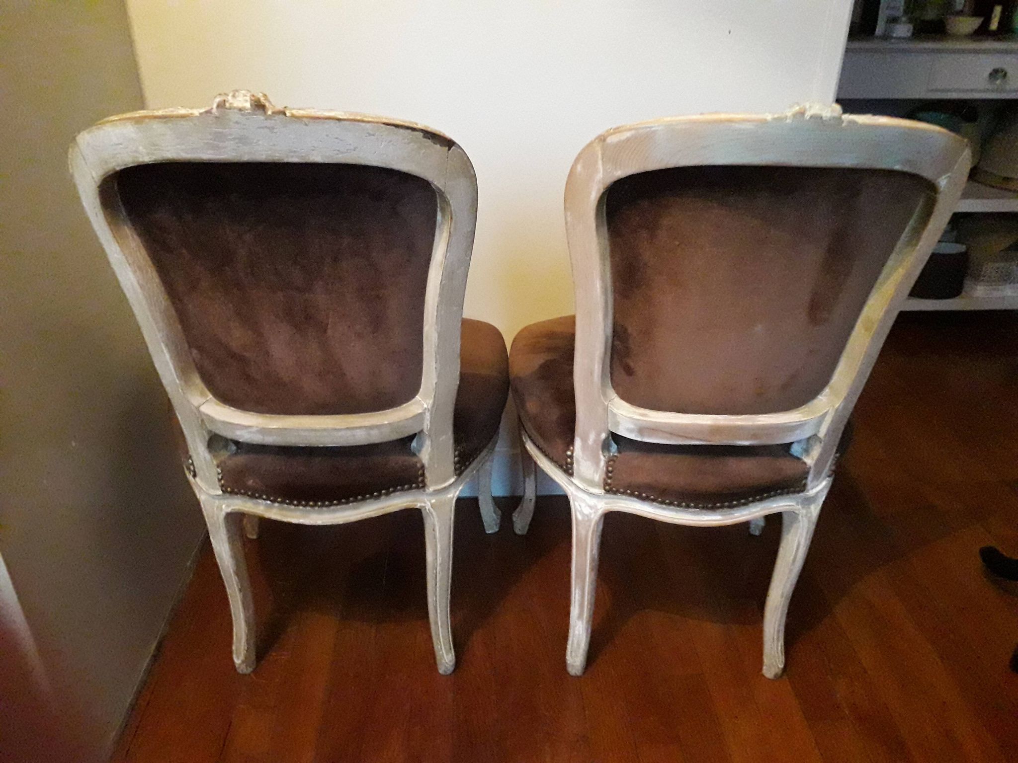 A pair of Louis XV style armchairs in wood and velvet fabrics