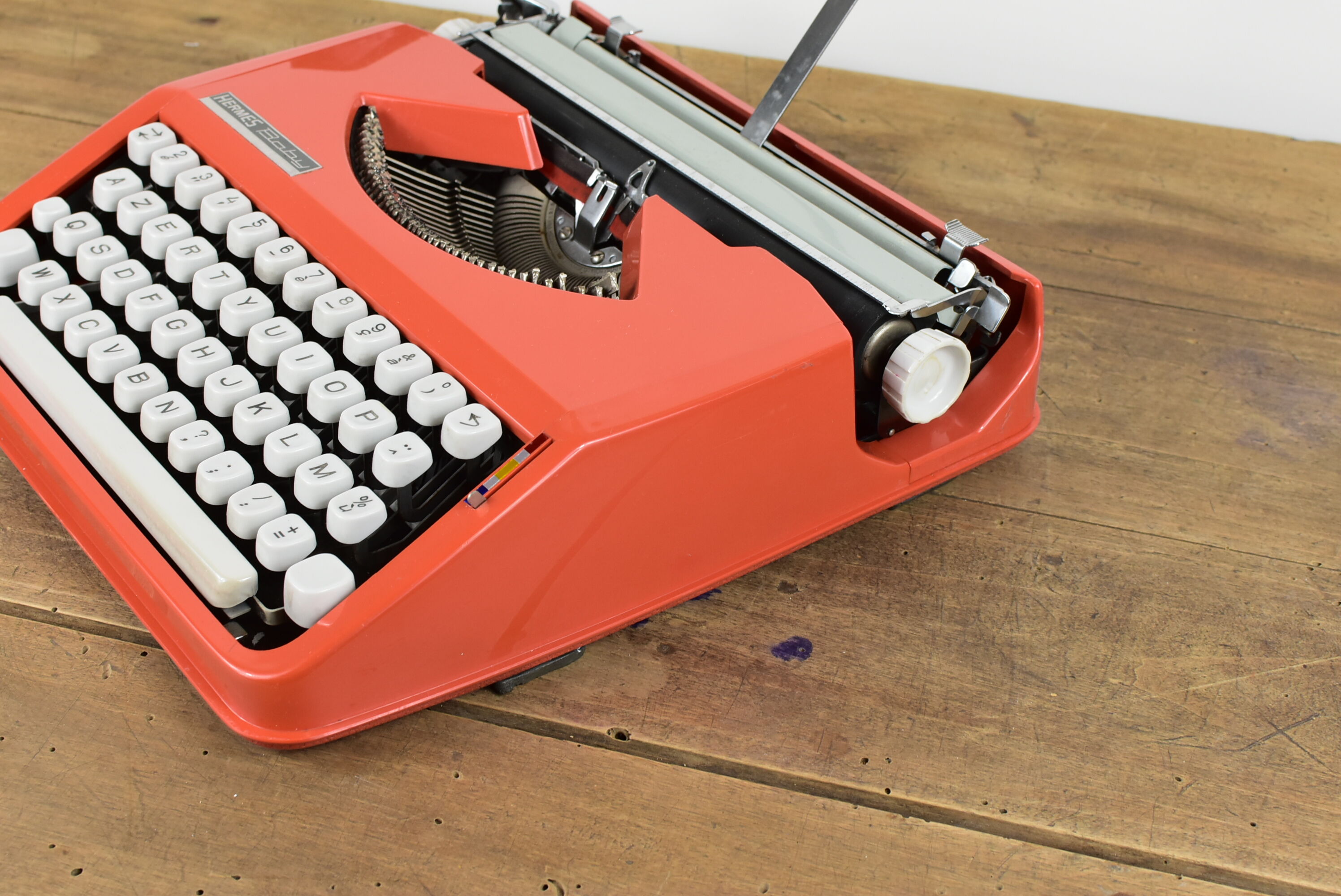 Hermès Baby orange typewriter.
