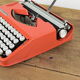 Hermès Baby orange typewriter.