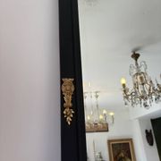 Large matte black mirror