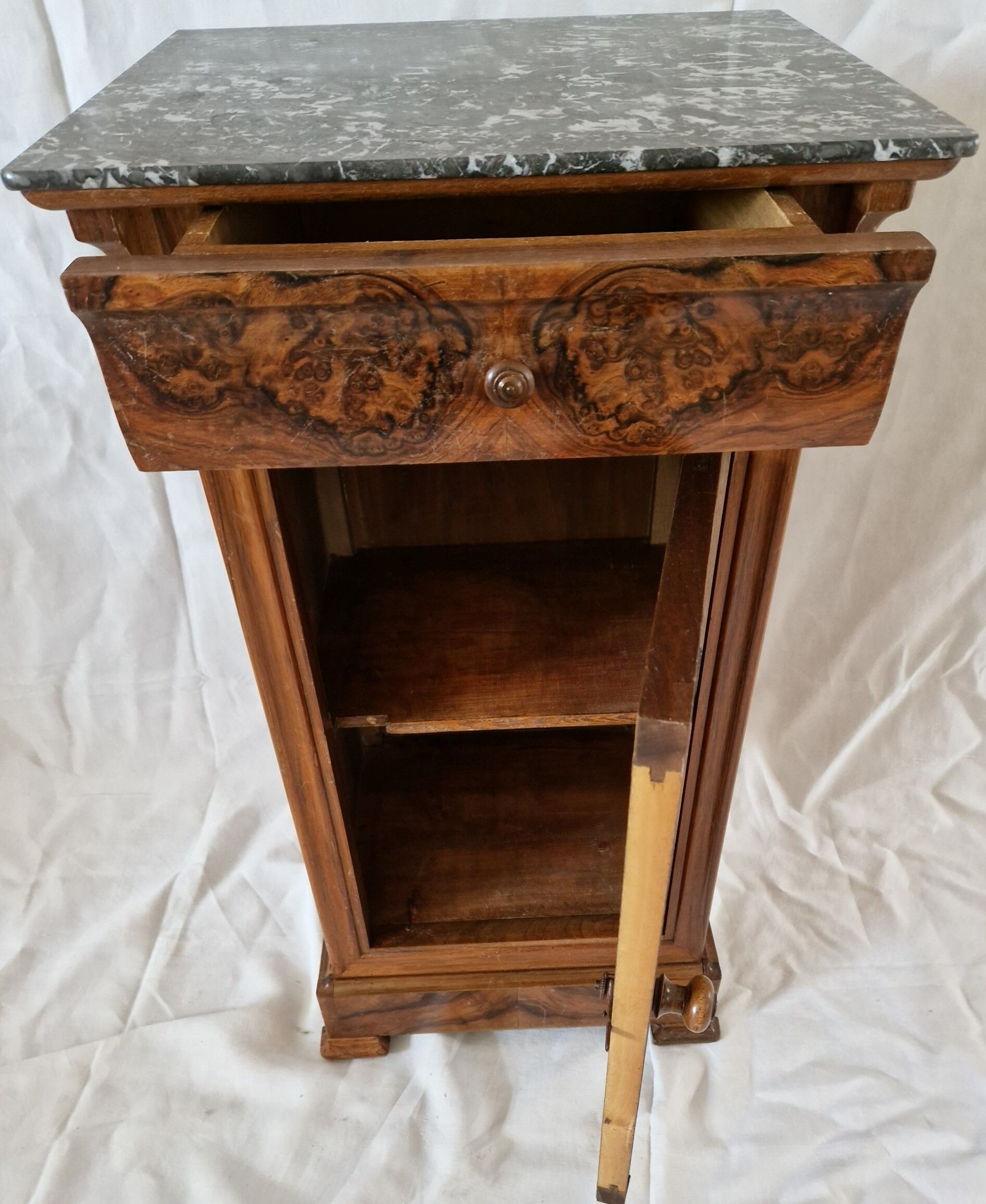 Elegant antique Napoleon III side table in walnut with black marble veneer.