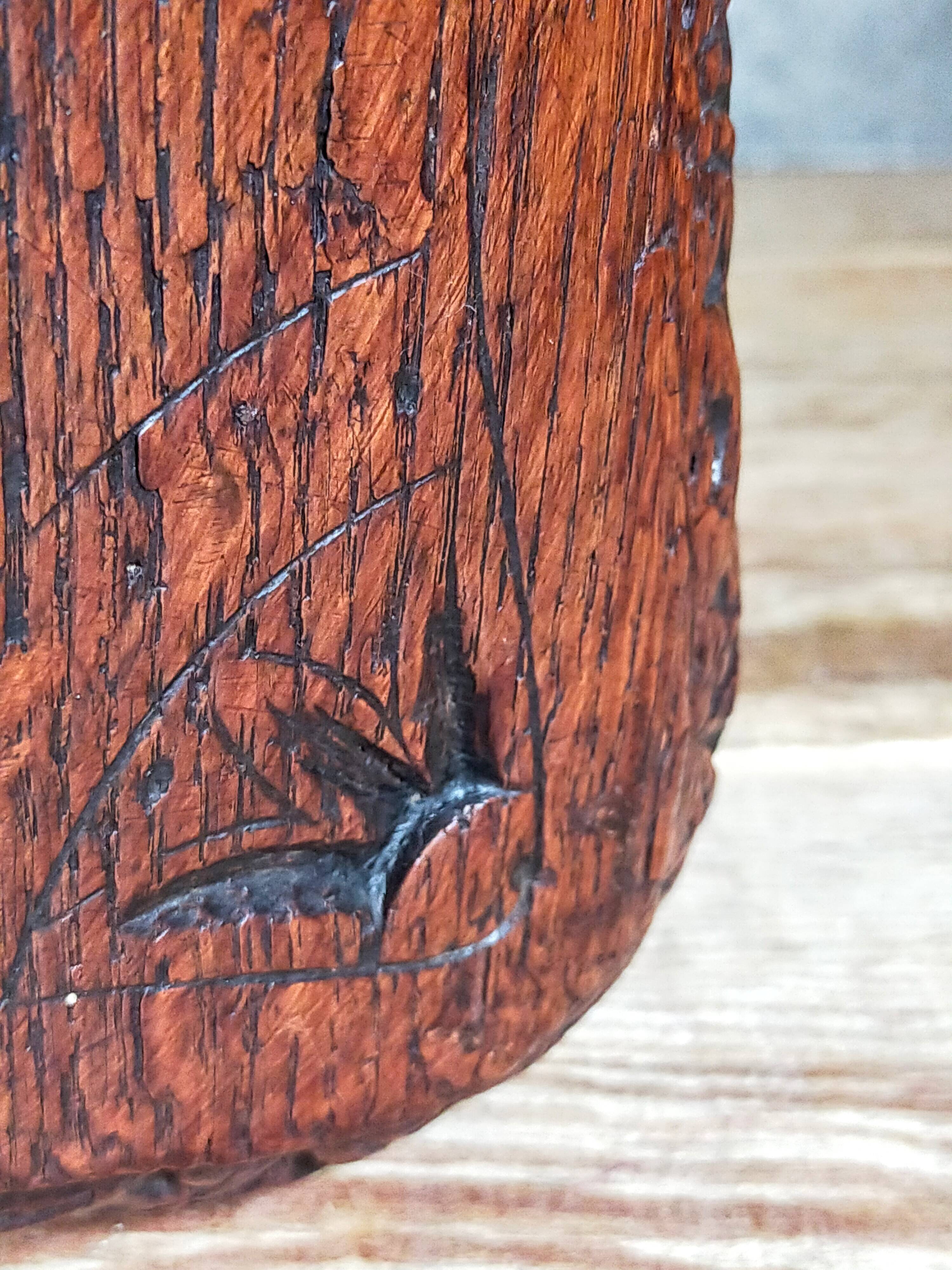 Antique stool in turned and carved solid wood