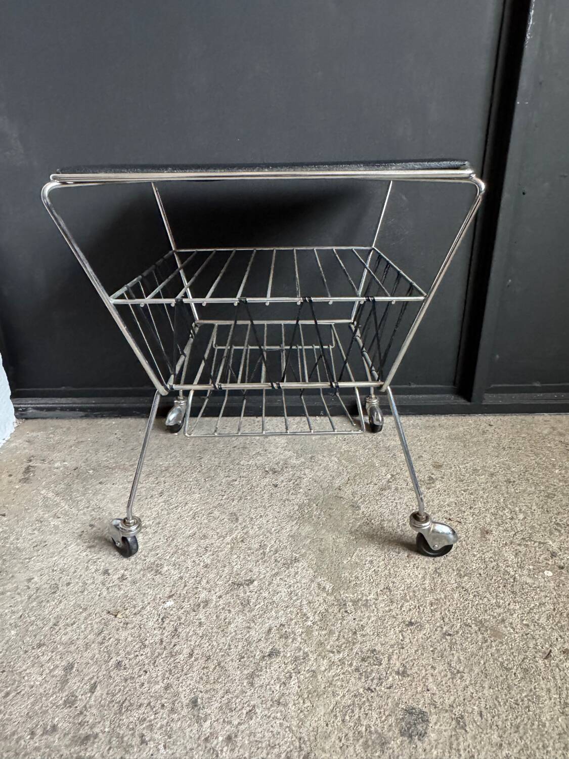 1950s rolling magazine rack