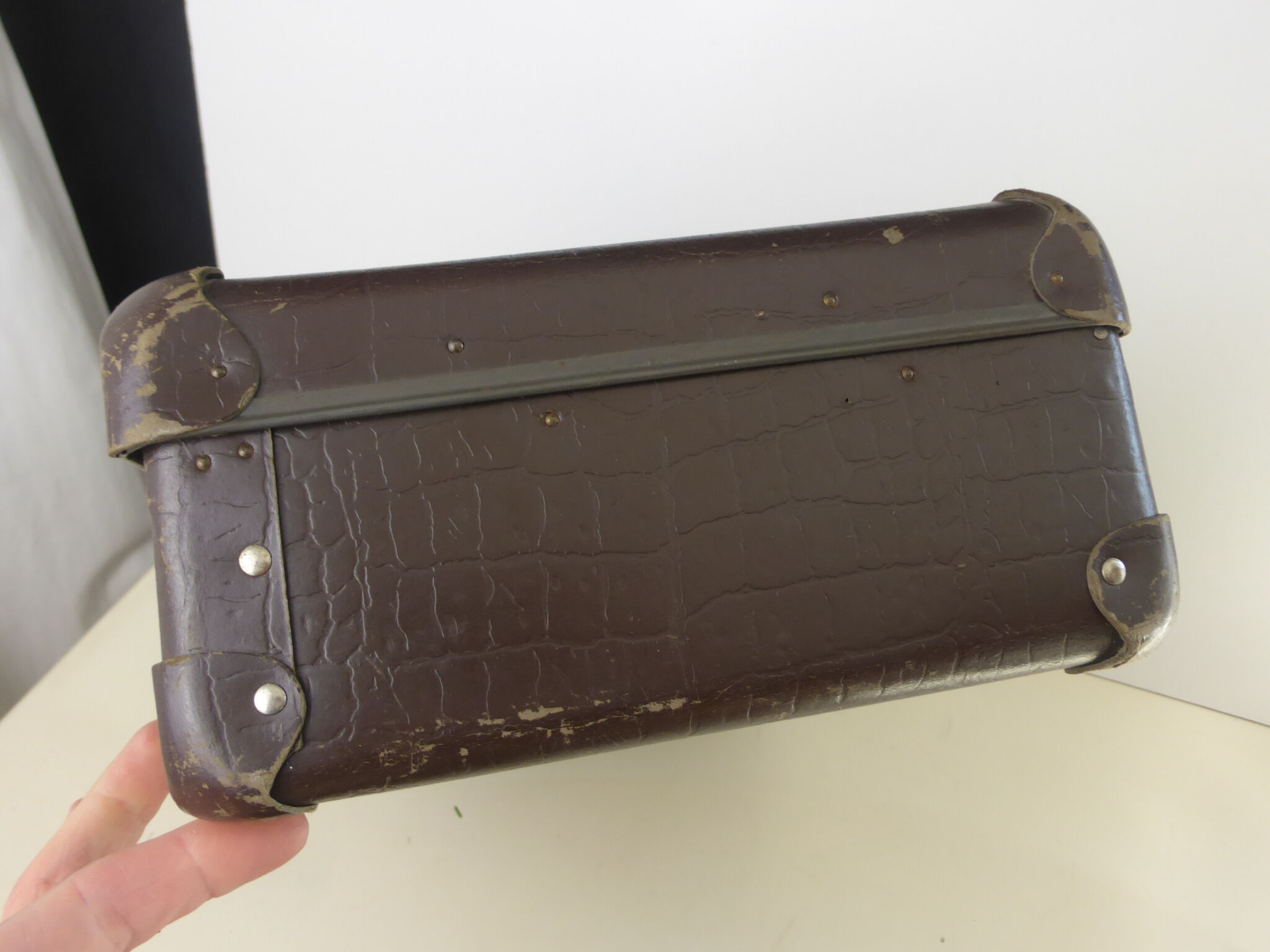 Old brown cardboard suitcase imitating the croco 50s/60s