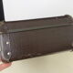 Old brown cardboard suitcase imitating the croco 50s/60s
