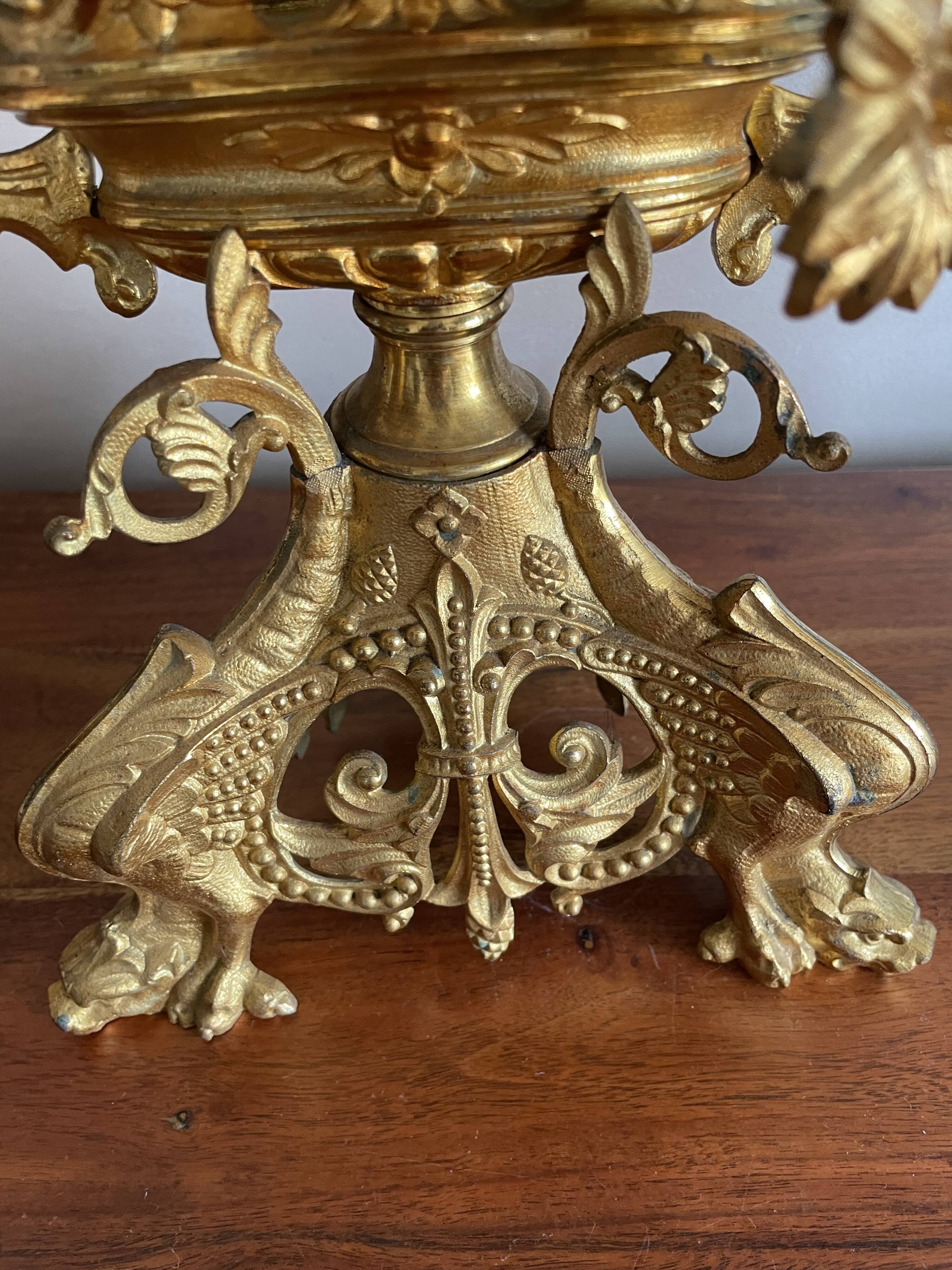 Brass church candelabra with fleur-de-lys