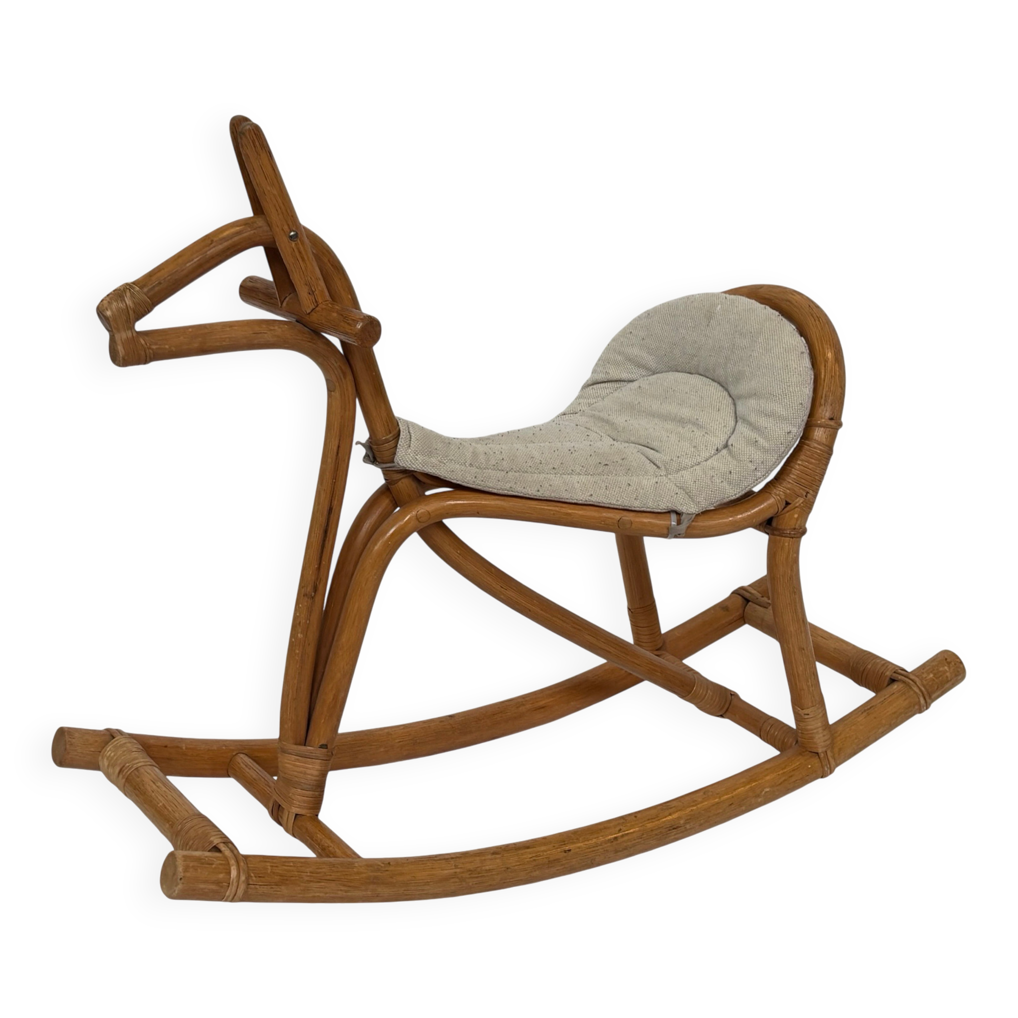 Vintage rattan rocking horse for a 1960s nursery design