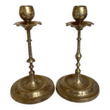 Pair of brass candlesticks with worked flower balls.