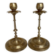 Pair of brass candlesticks with worked flower balls.