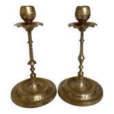 Pair of brass candlesticks with worked flower balls.