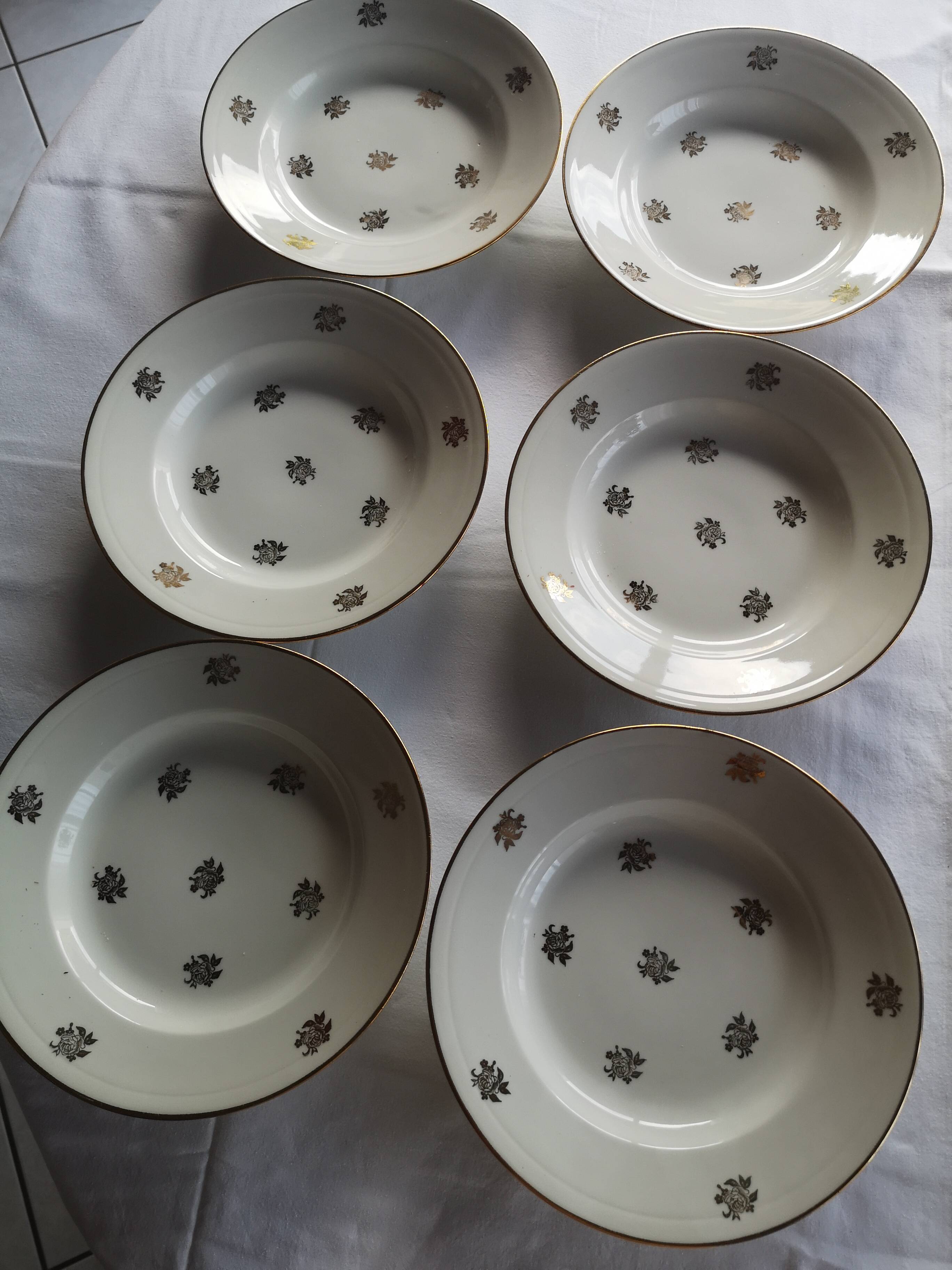 12 antique deep plates in French porcelain
