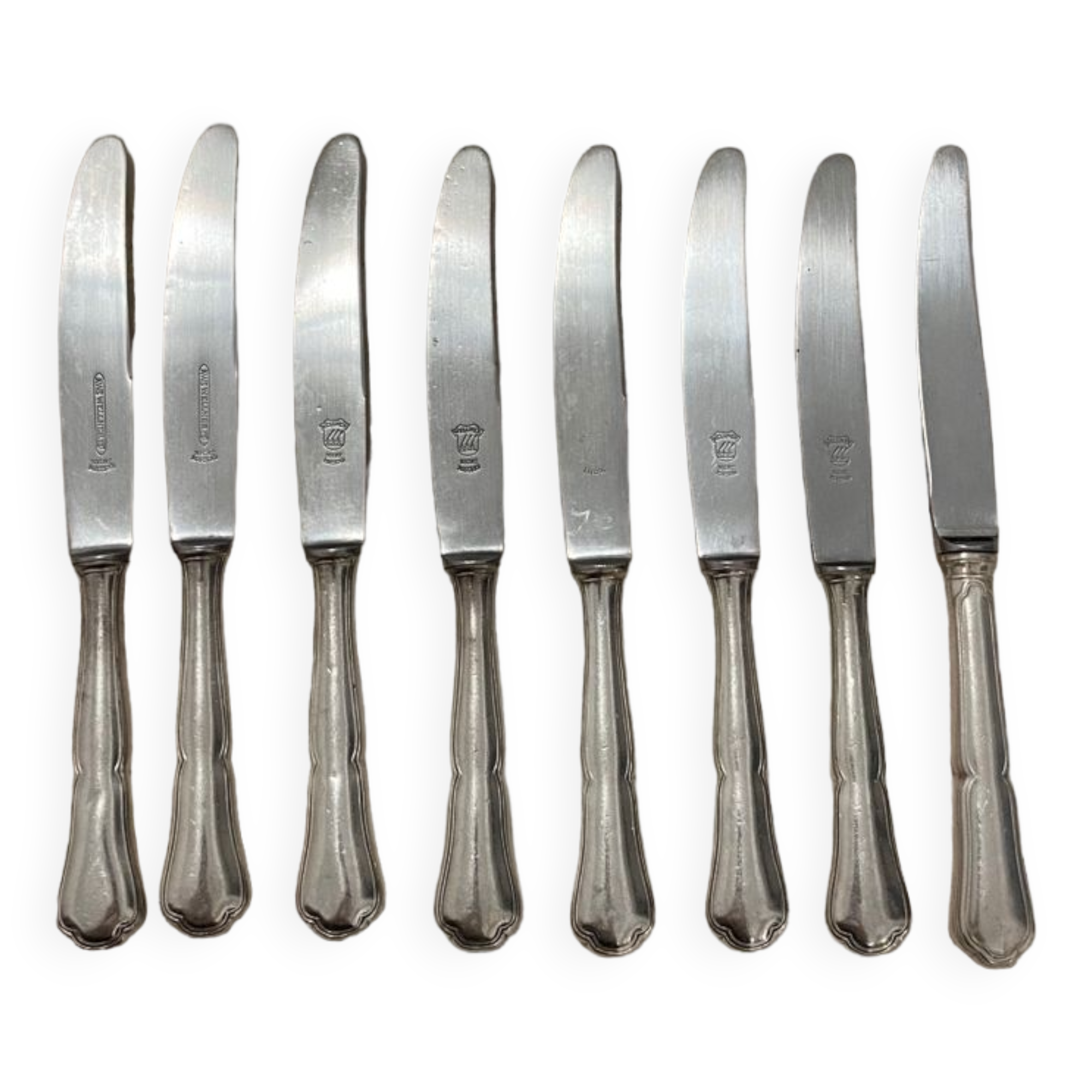 Set of 8 cheese knives in silver metal