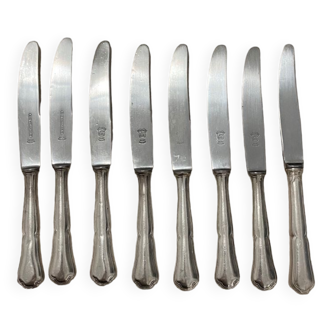 Set of 8 cheese knives in silver metal