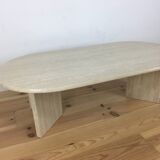 Oval coffee table in travertine