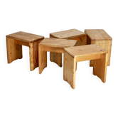 Selection by Charlotte Perriand for Les Arcs, set of 5 pine stools. France, circa 1960