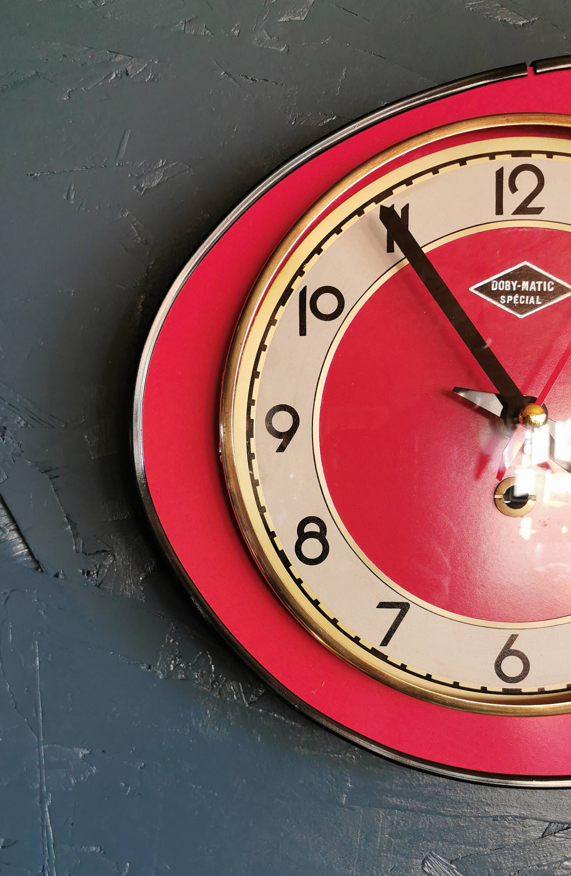 Vintage formica clock silent asymmetrical wall pendulum "Doby Matic red"