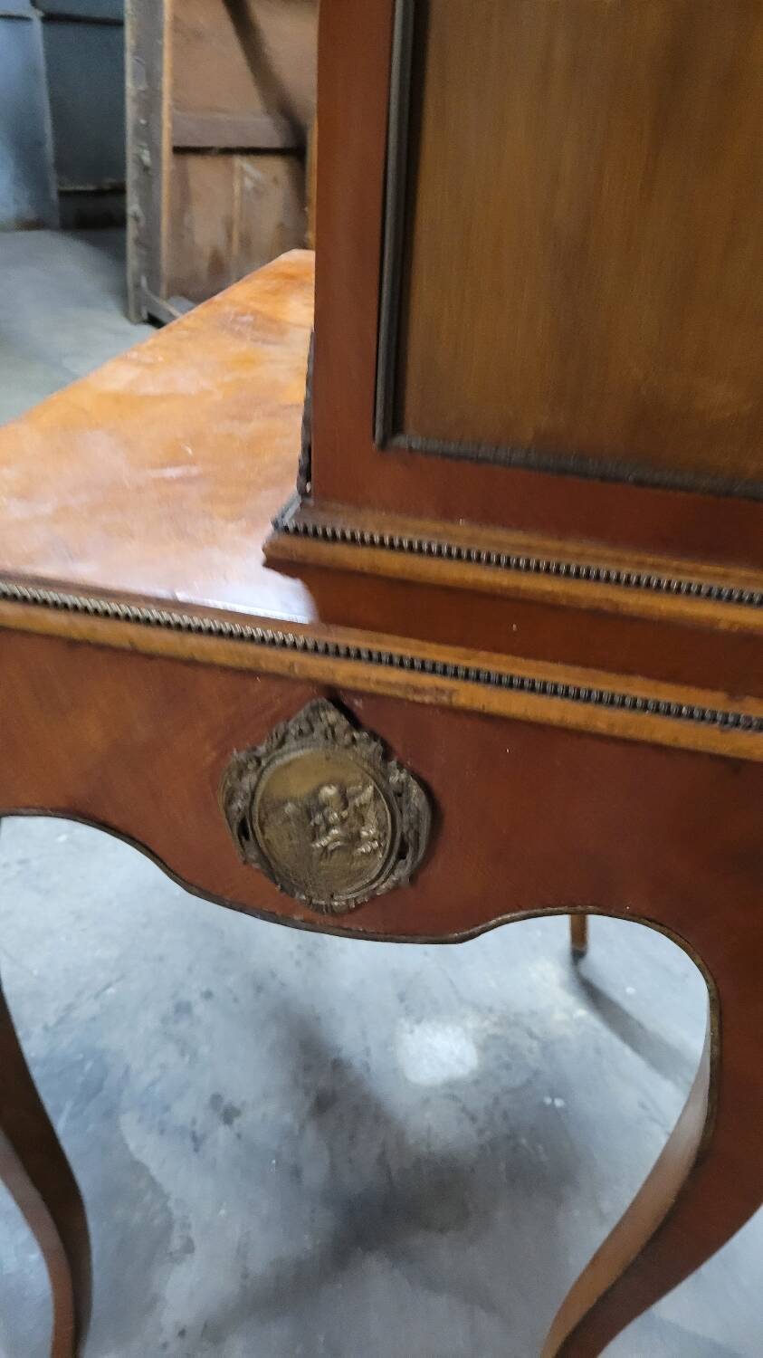 Louis XV bonheur du jour in rosewood marquetry decorated with bronze.