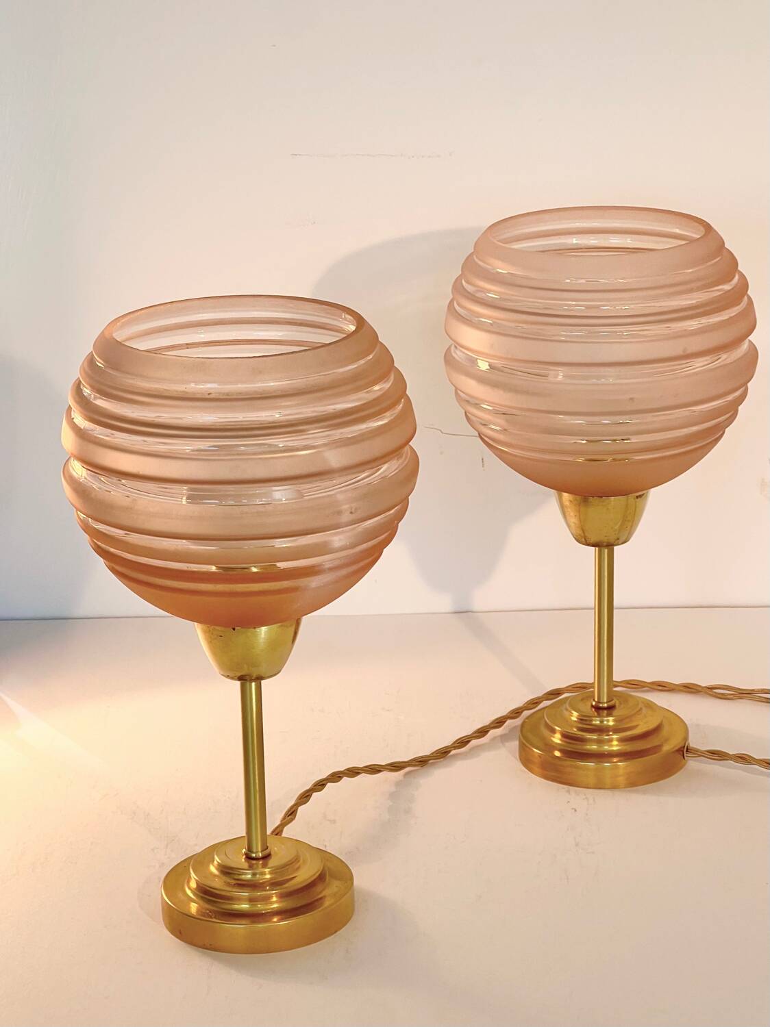 Pair of Art Deco bedside lamps in brass and etched glass