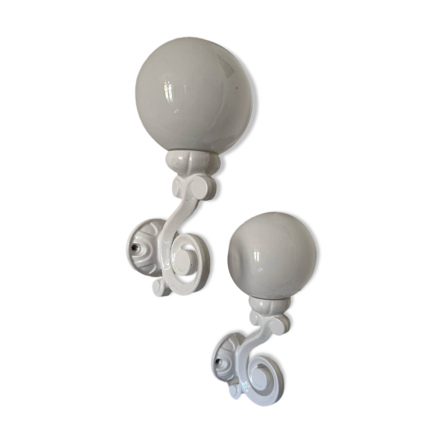 Cast iron and opaline wall lights from the 70s