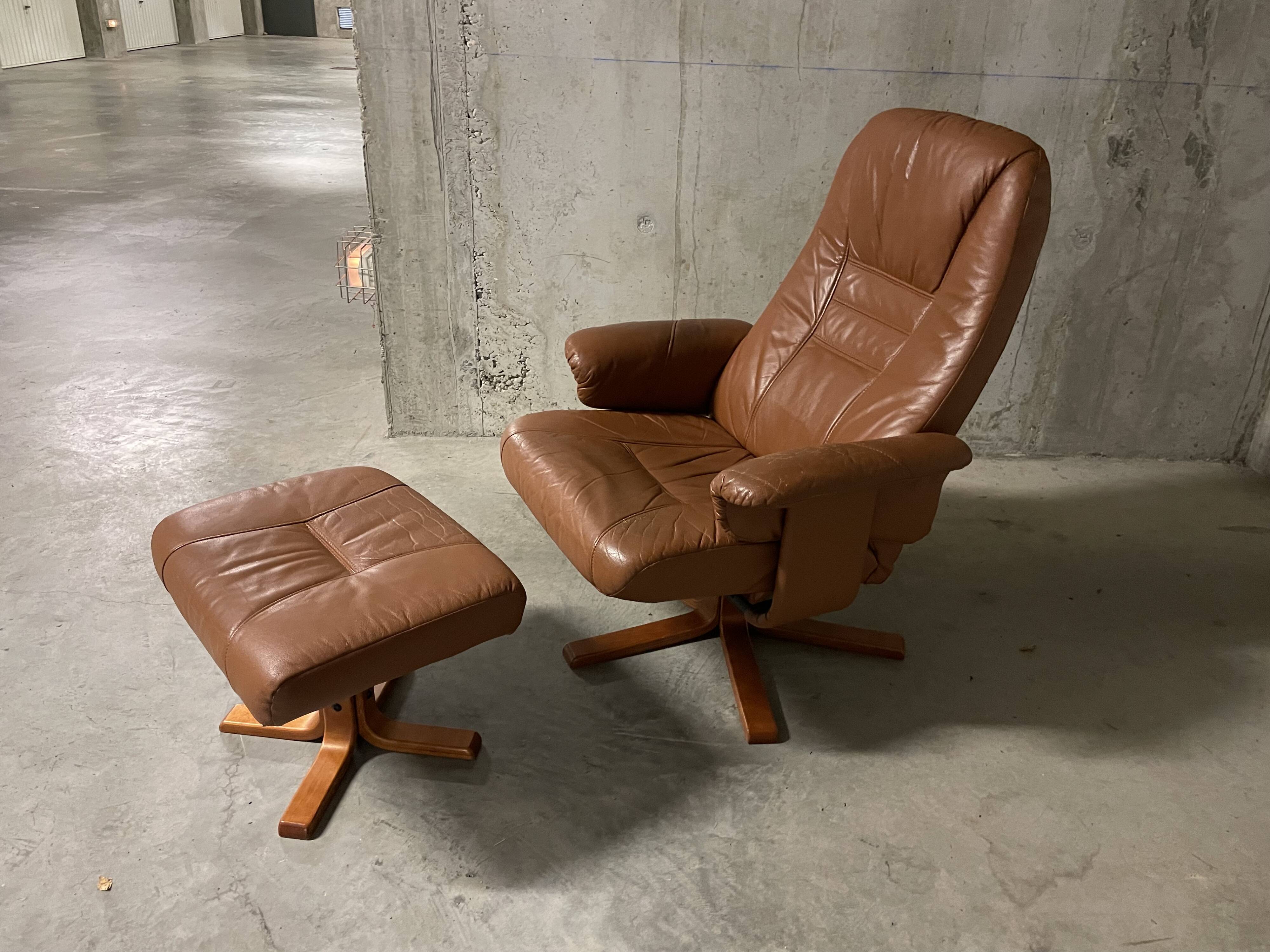 Unico leather armchair and ottoman