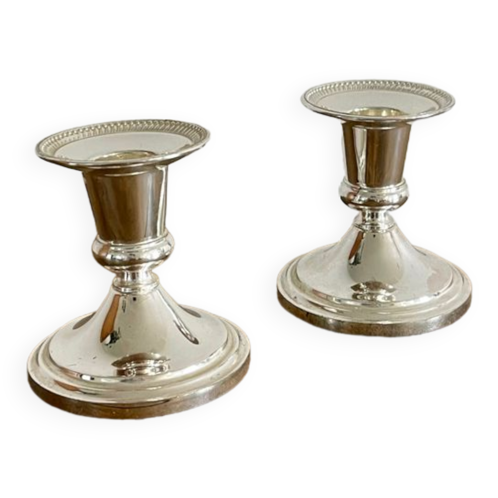 Pair of silver metal candle holders