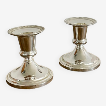 Pair of silver metal candle holders