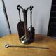 Small and discreet brass fireplace tool set.