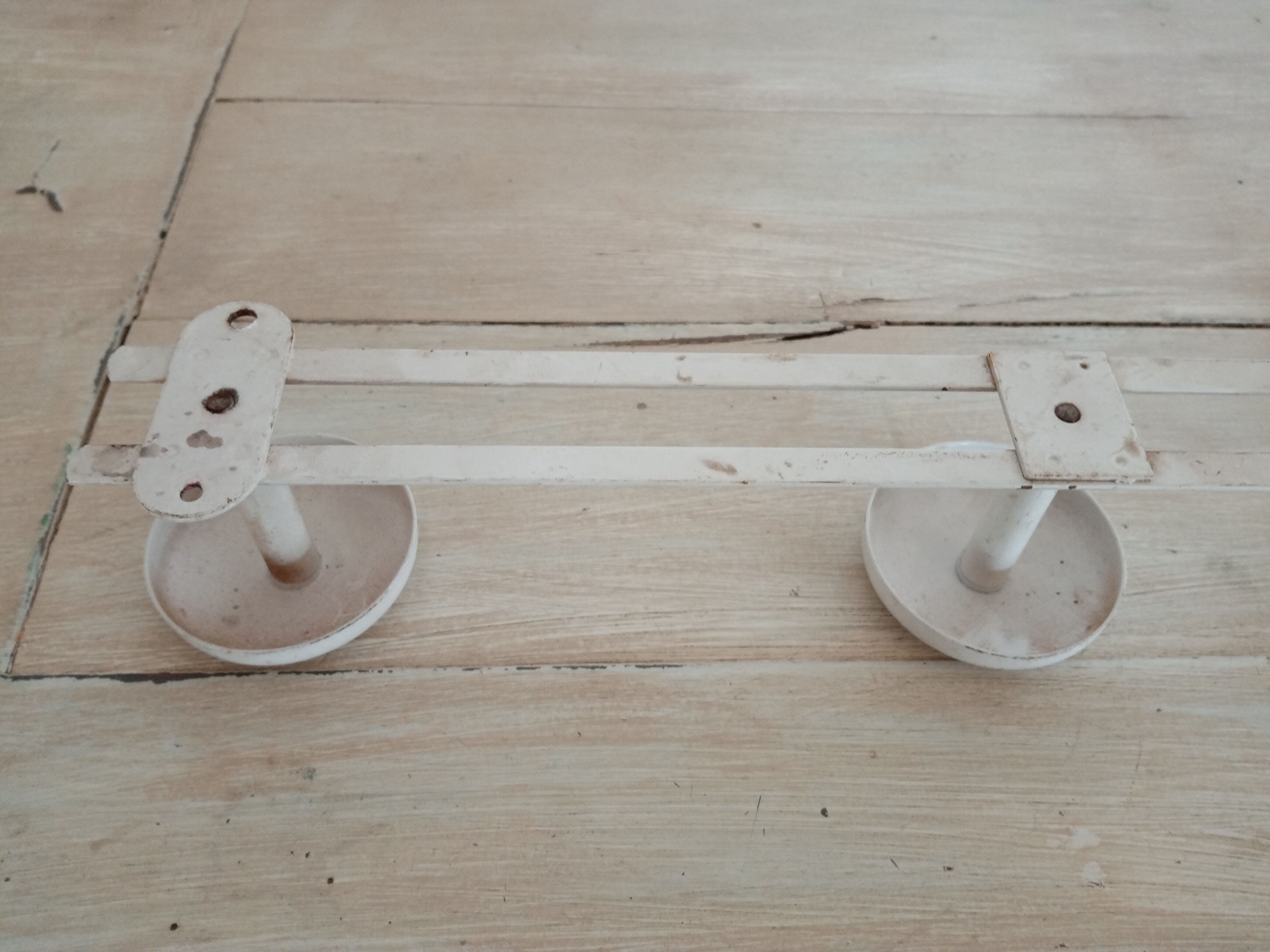 Metal wall coat holder