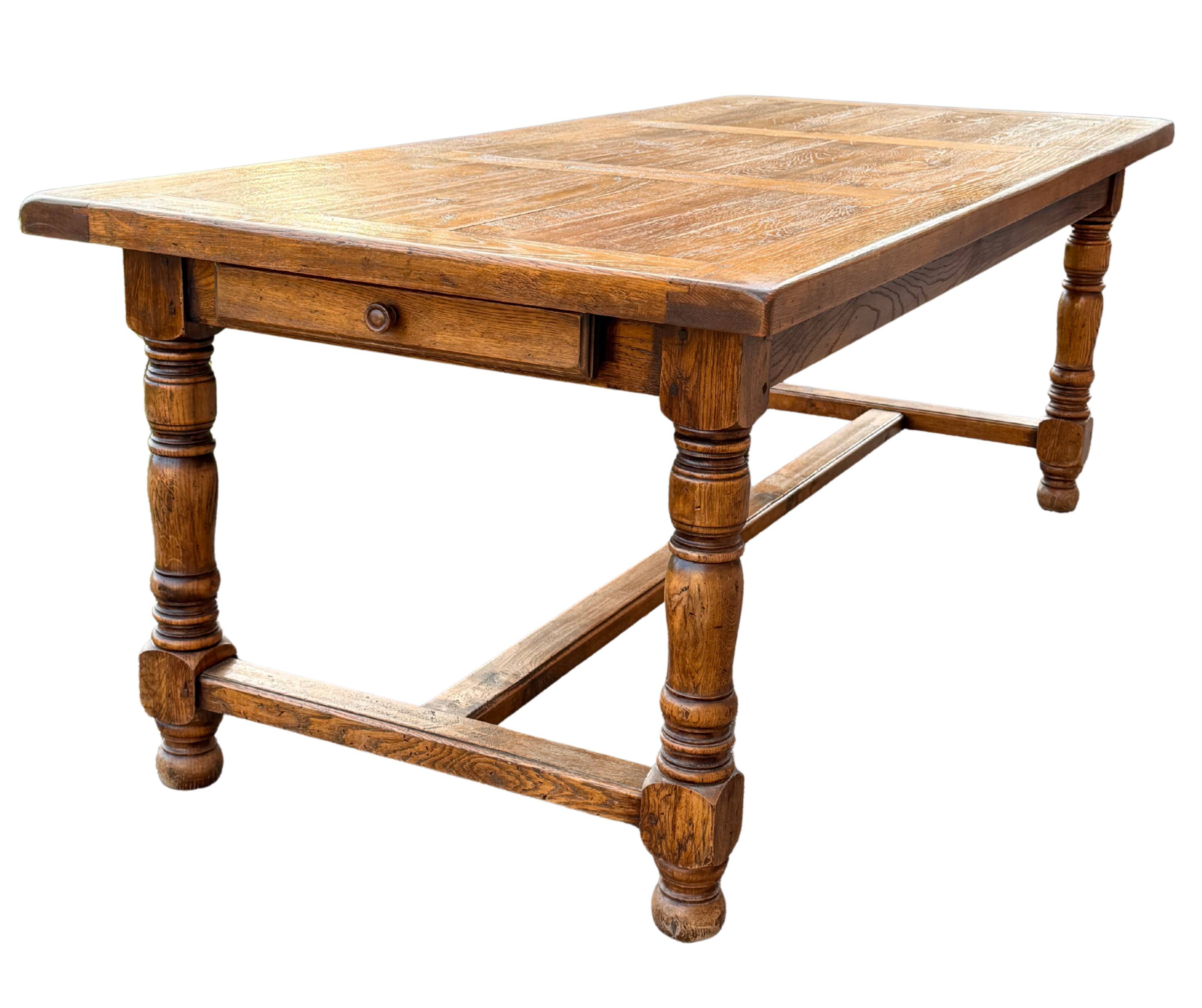 Large farmhouse table made of solid wood.