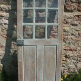 Porte vitrée en chêne brut