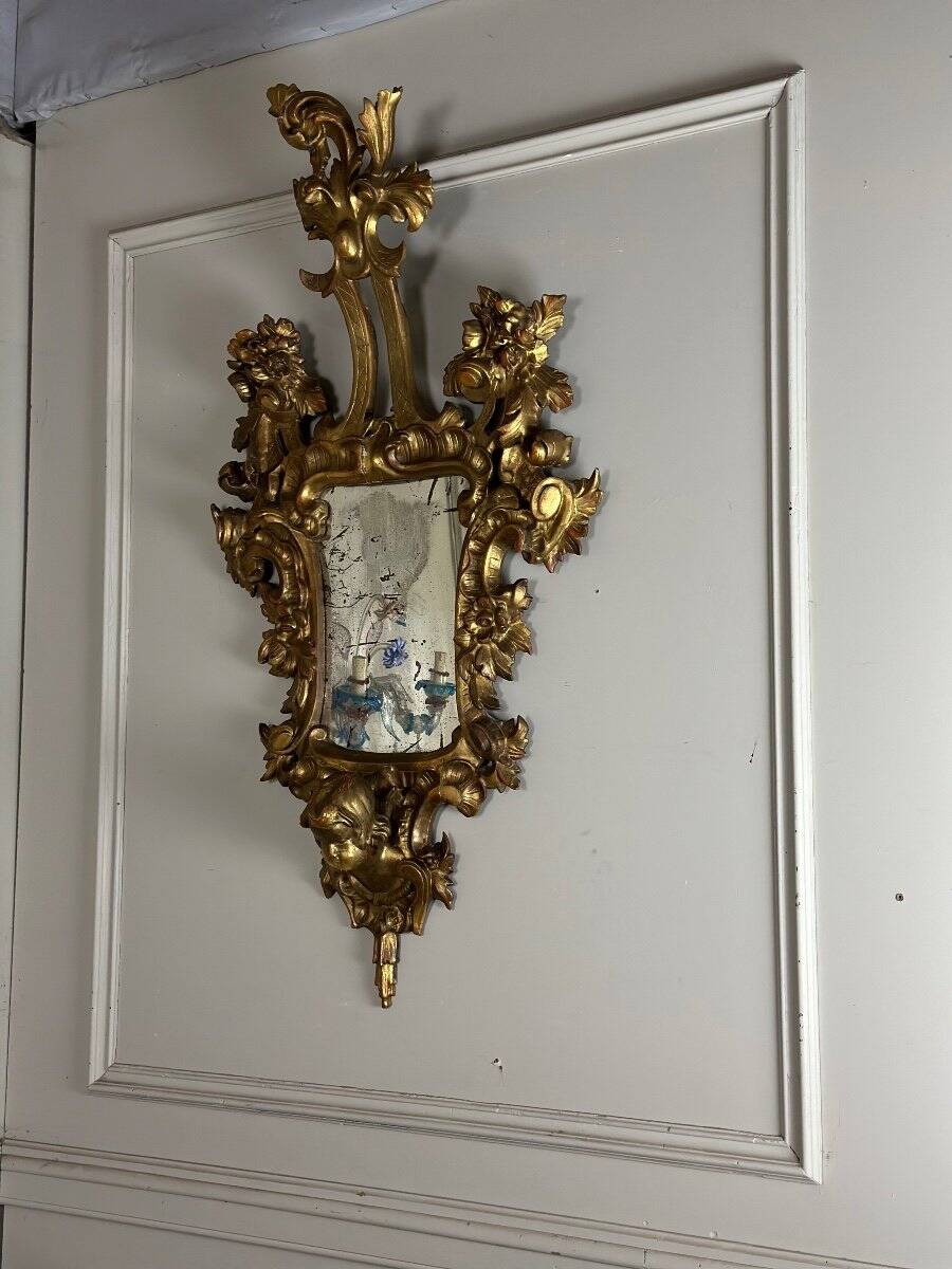 Pair of carved and gilded wooden mirrors, Italy 19th century