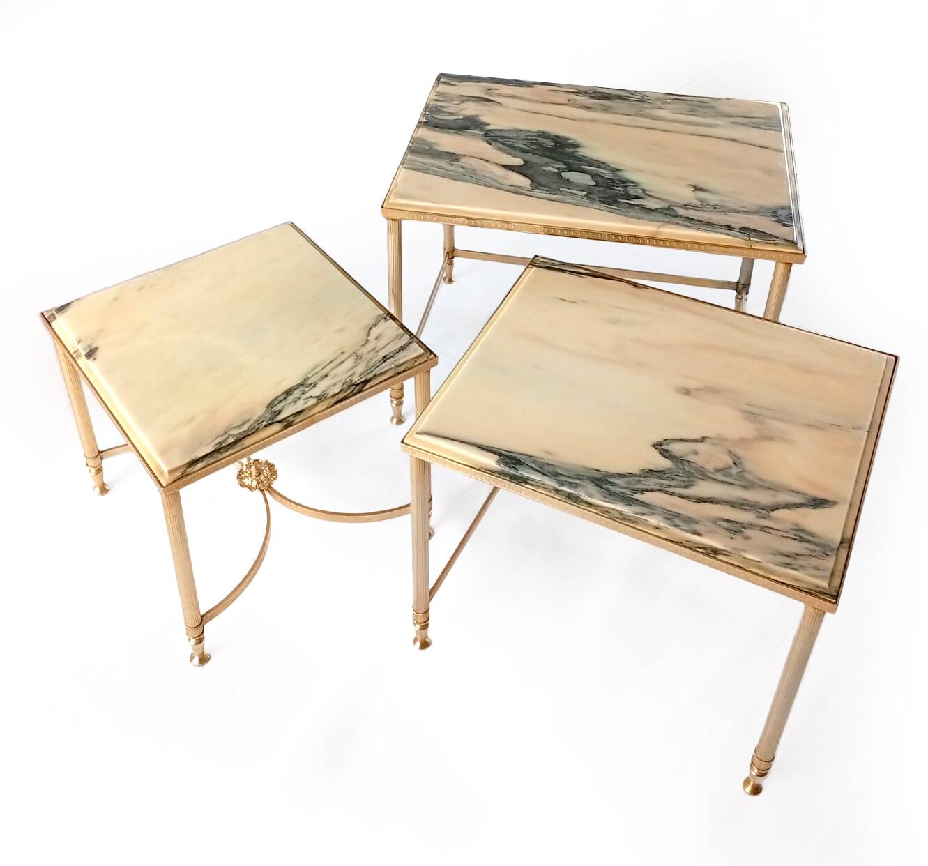 Nested tables in brass and marble.