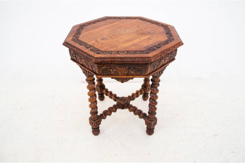 Carved table, France, circa 1910.