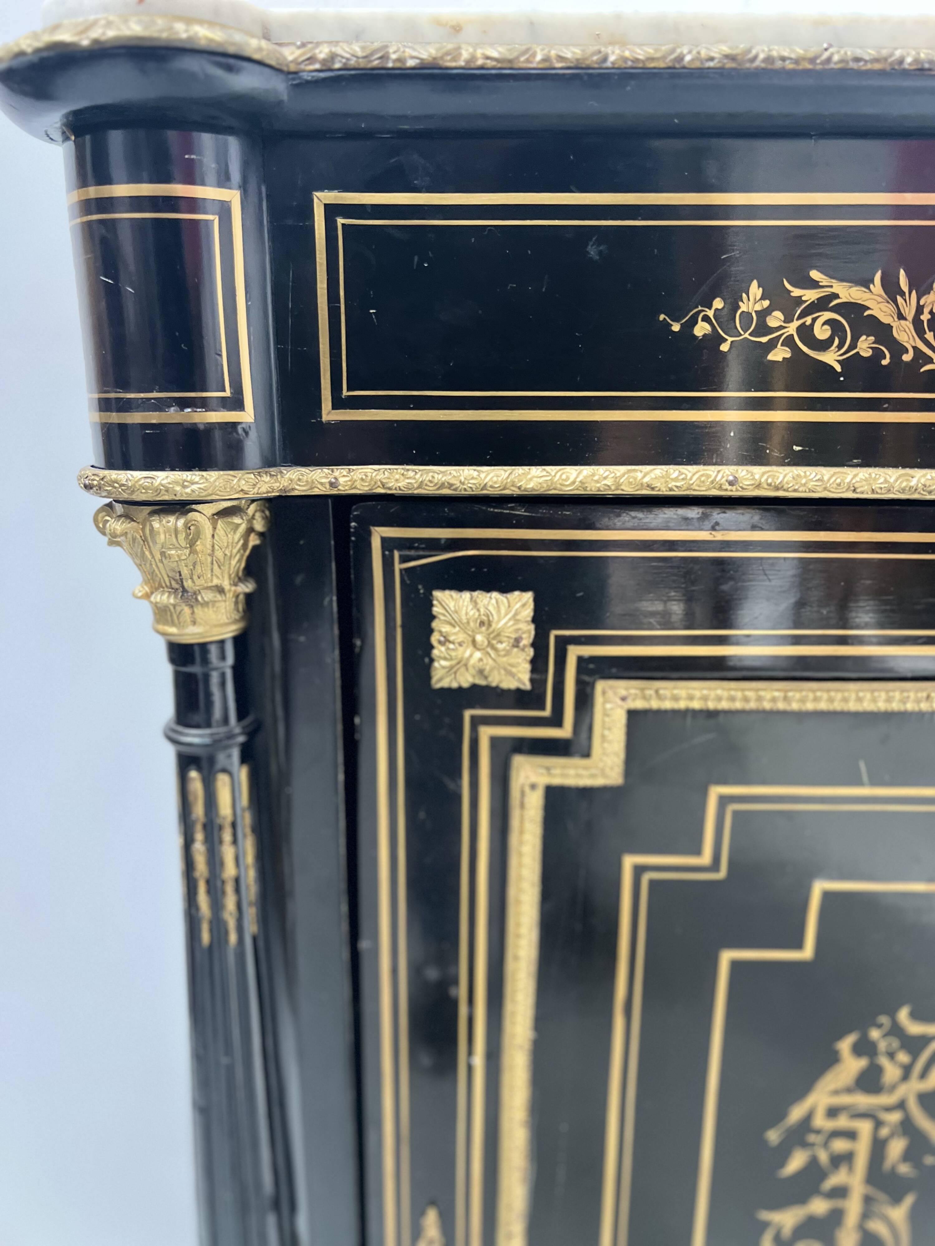 Napoleon III furniture has a black wooden door and brass marquetry 19th century