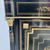 Napoleon III furniture has a black wooden door and brass marquetry 19th century