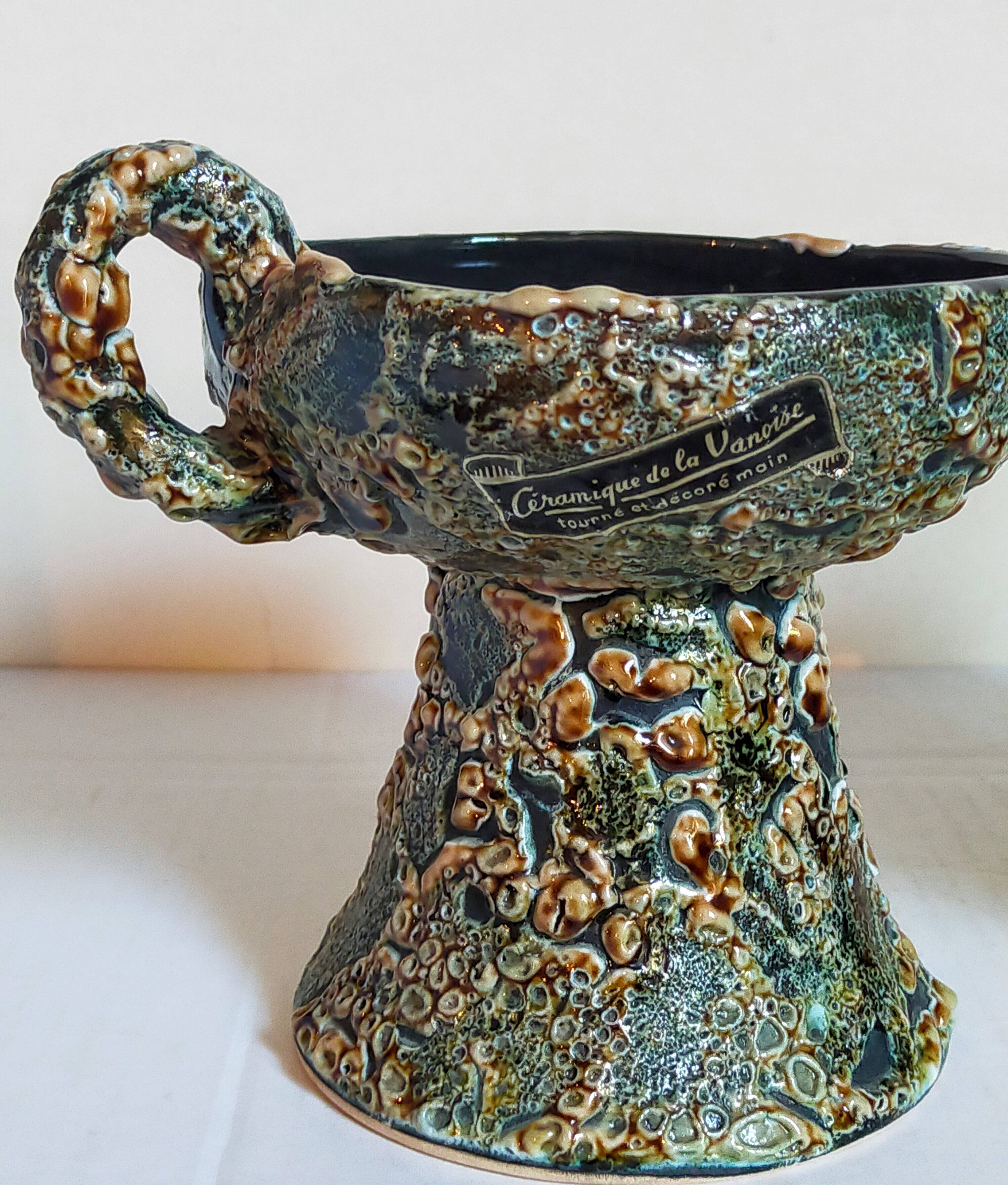 Pair of vintage Vanoise honey foam ceramic candlesticks