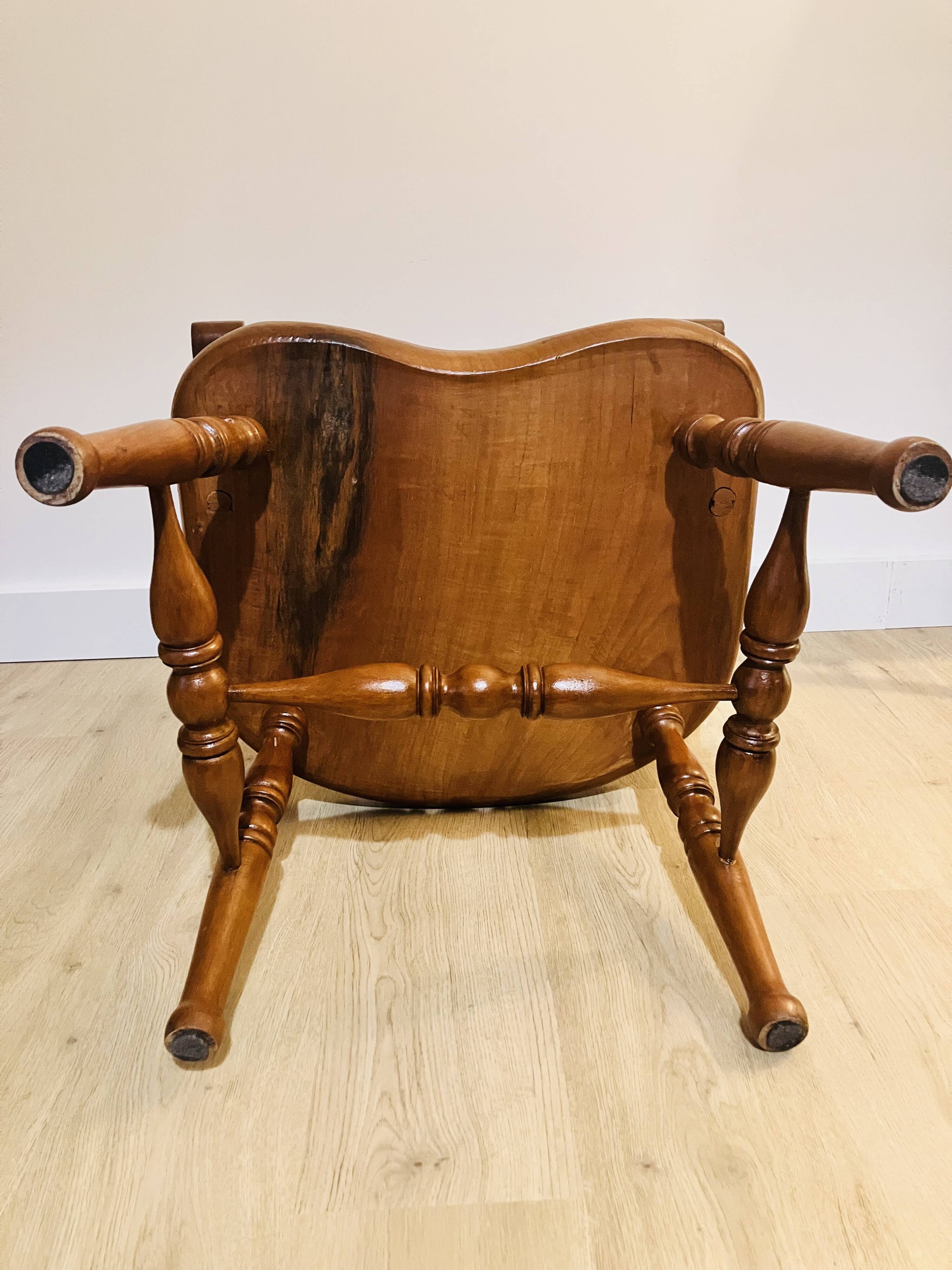 Solid wood chair with armrests