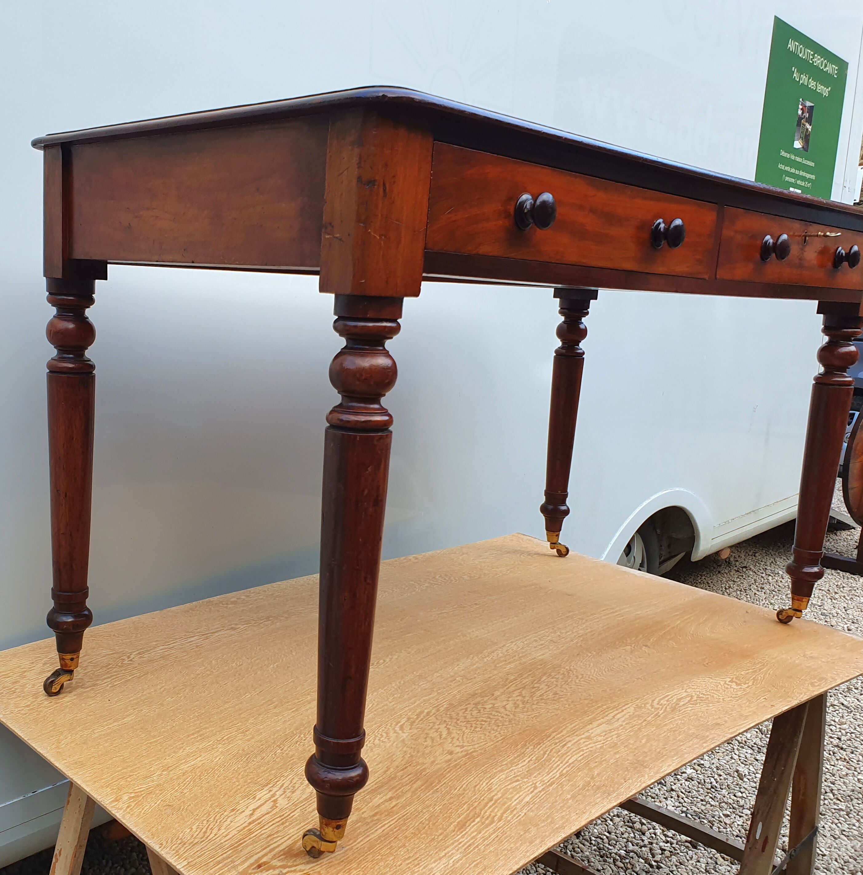 English desk with 2 drawers on green leather
