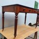 English desk with 2 drawers on green leather