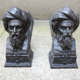 Pair of men's cast iron channels with turban