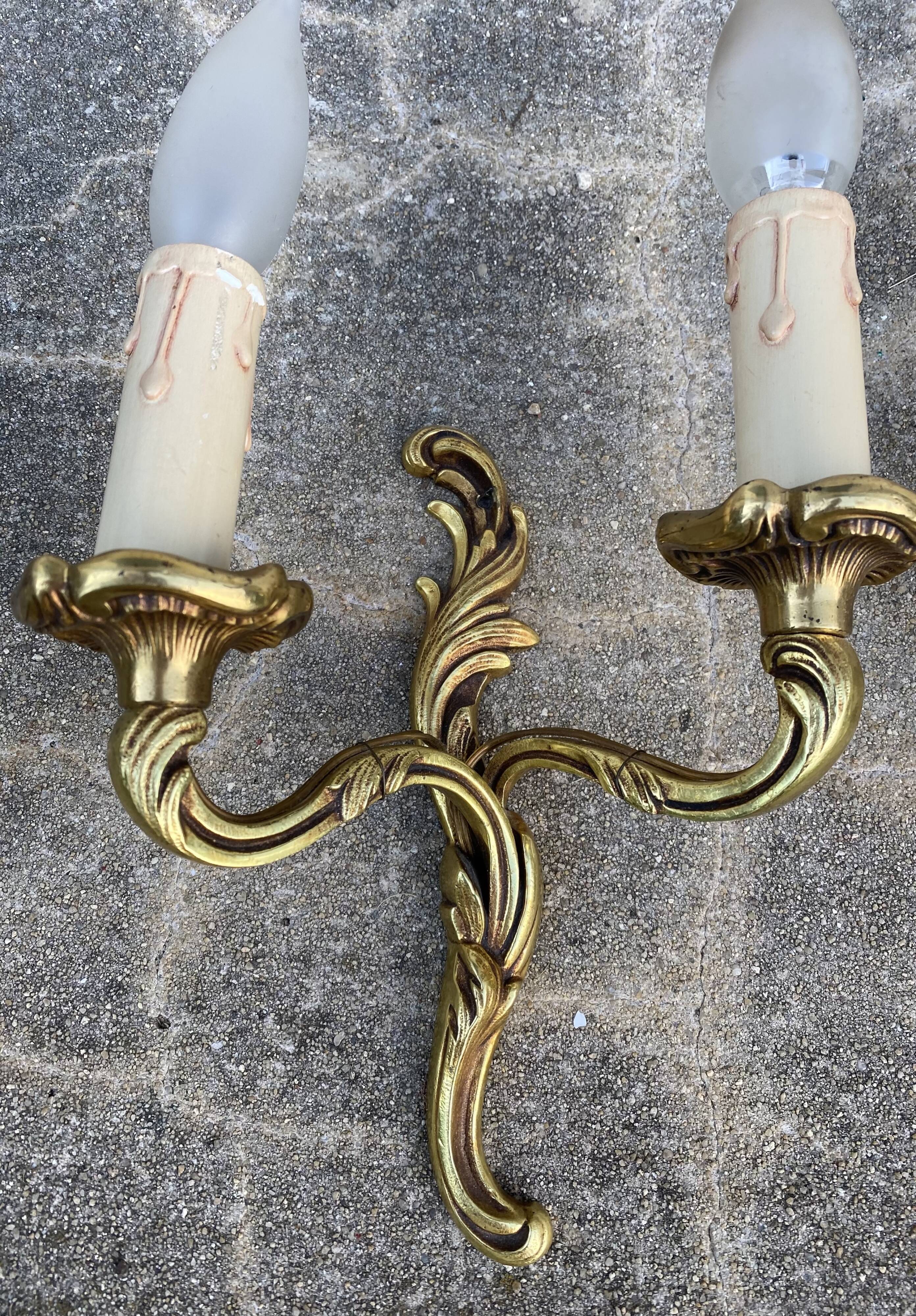 Pair of baroque gilt bronze wall lamps