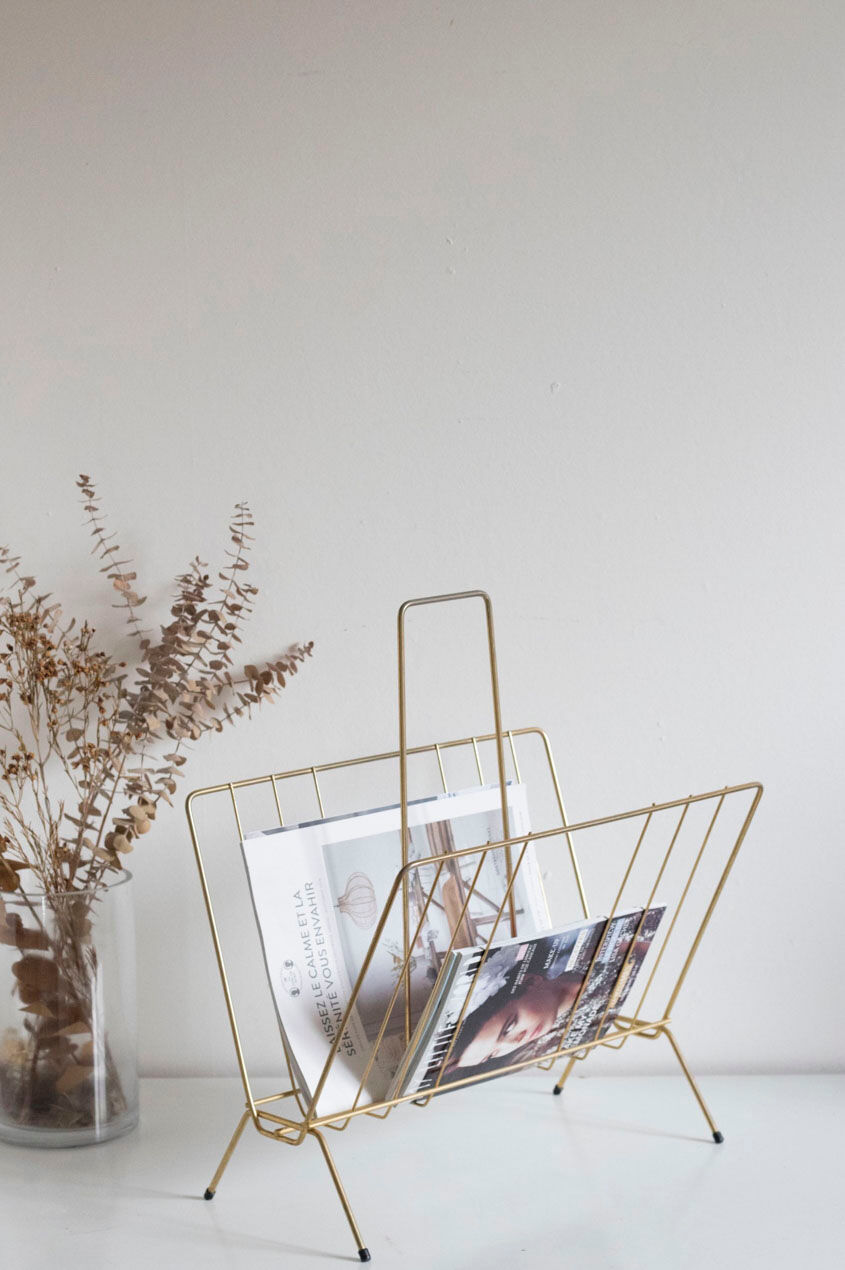 Vintage magazine holder in gold metal