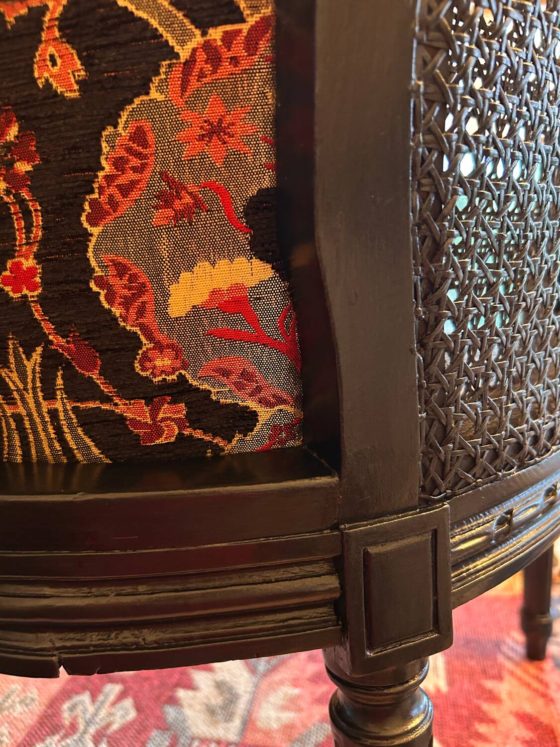 Louis XVI armchair with caning and dark green velvet