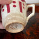 Set of two antique opaque porcelain cups from Gien.