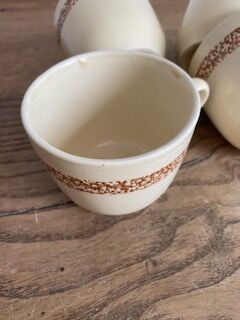 Lot of 4 coffee cups in sandstone