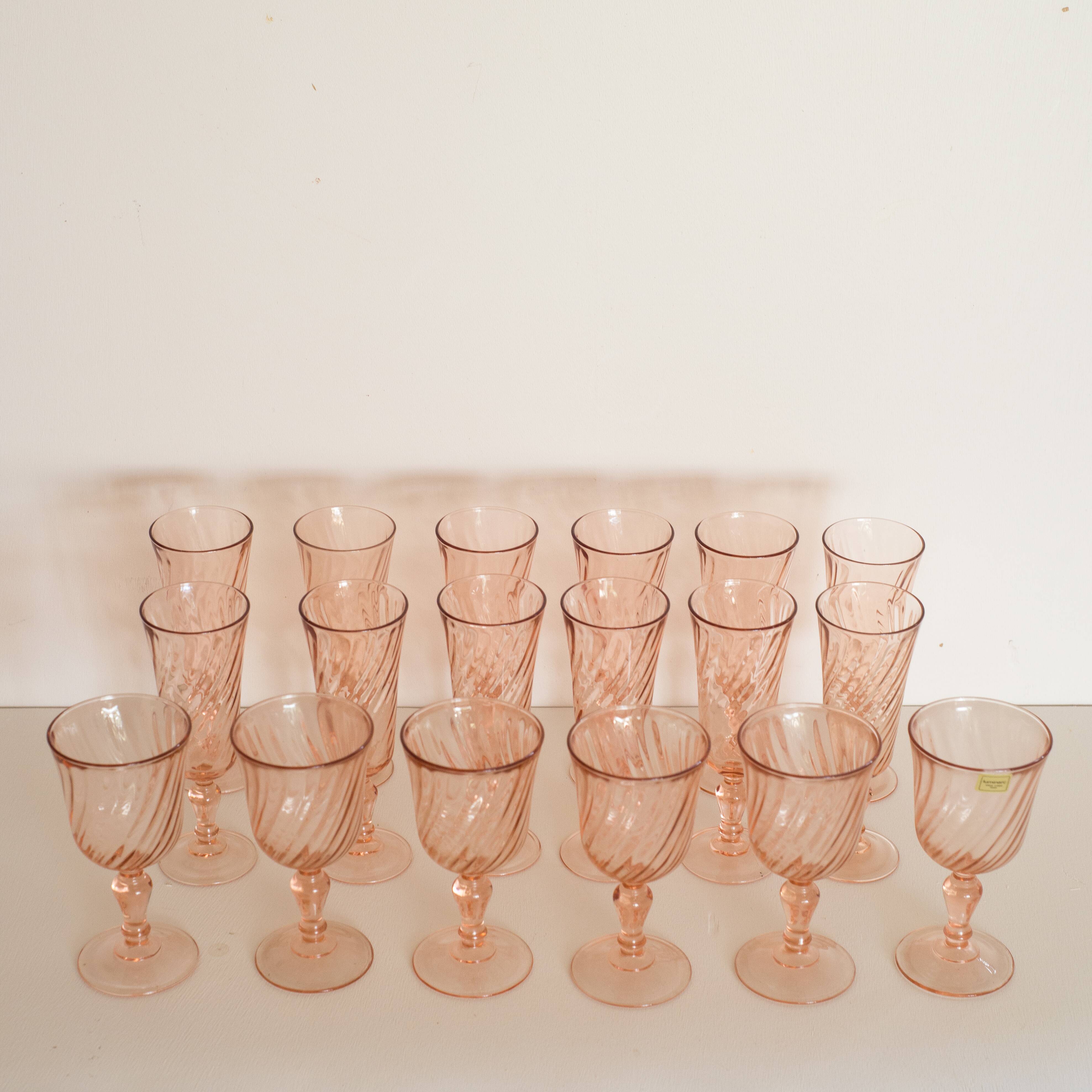 Set of 12 champagne flutes and 6 large glasses