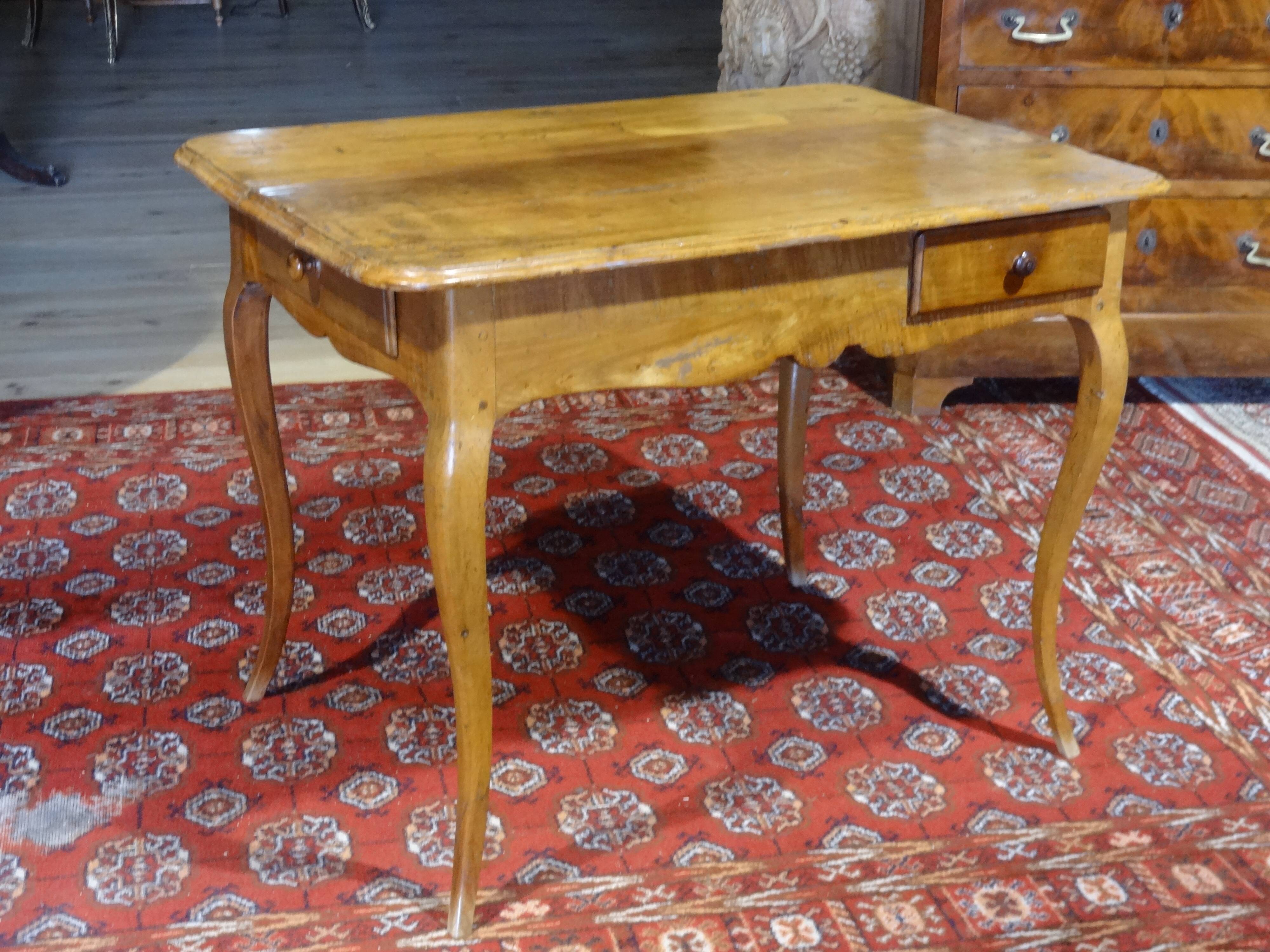 Cherry table, eighteenth century, Louis XV with two drawers
