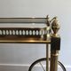 Brass rolling table with removable double trays from Maison Jansen.